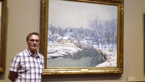 artist, roy munday, in front of edward willis redhead's painting in washington, usa